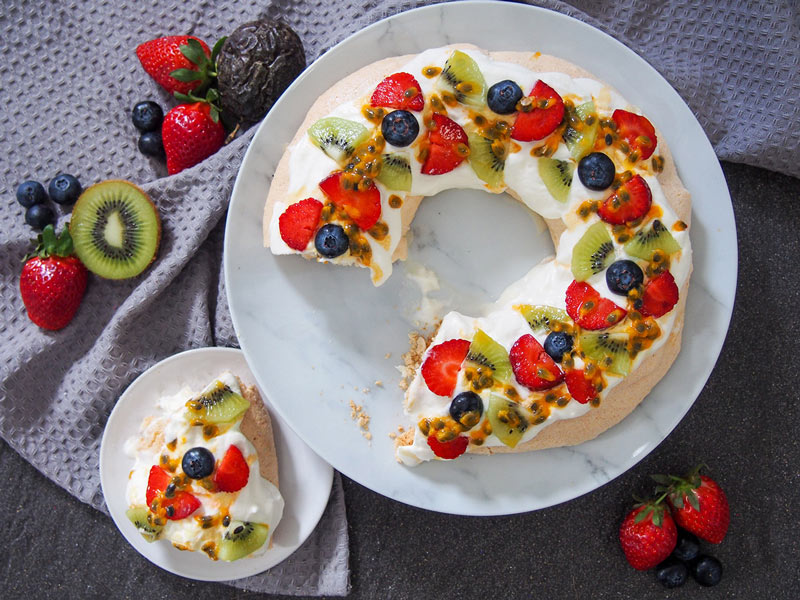 Australian Christmas pavlova wreath - Pavlova is a fun an easy dessert for kids to help make. Everyone will enjoy this addition to your homeschool Australia unit study!