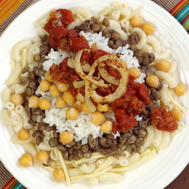 Egyptian kushari - pasta with chickpeas, lentils, rice, and other toppings