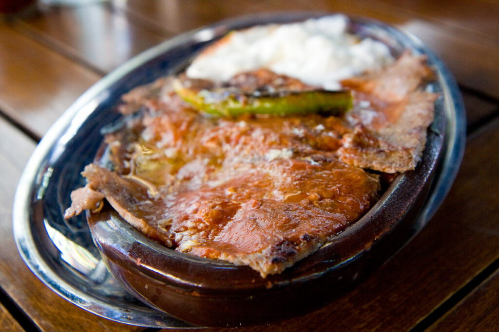 Iskender Kebap (kebab) - Turkish kebab / kebap meat dish - There many kinds of kebabs in Turkish cuisine. Try making one of them with your homeschool students as a part of your Turkey geography unit. 