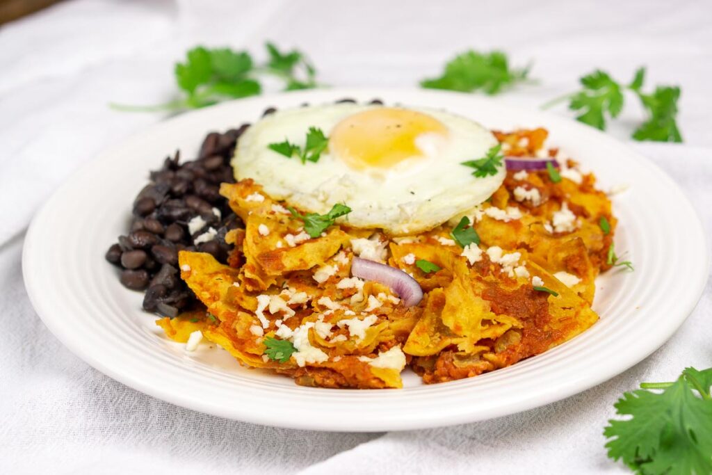 Mexican chilaquiles breakfast dish - Chilaquiles are a fun dish that children of all ages can help make as a part of their homeschool Mexico unit study. 