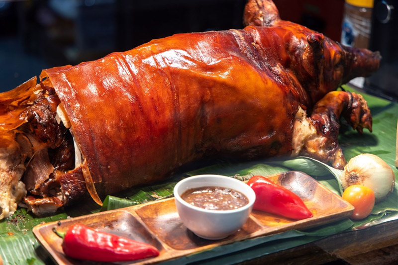 Lechon, roast pig - kids learn about Filipino food