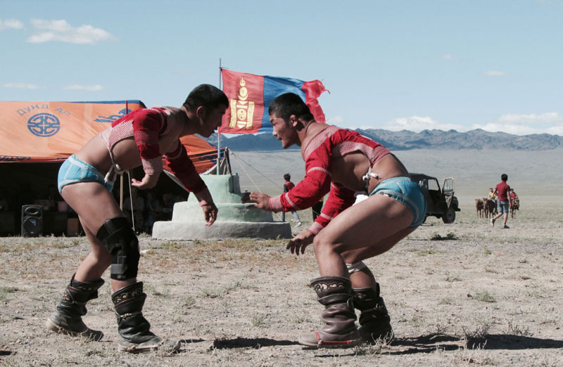Wrestling during the Naadam Festival in Mongolia - Image from Canva